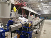 Dispositivo formador de varillas en espiral para la producción de mangueras en espiral de PVC